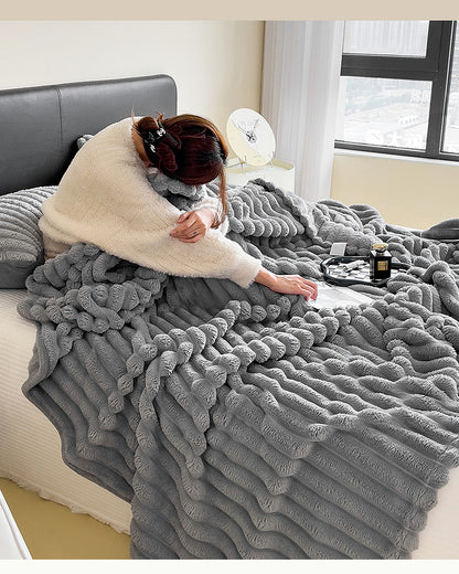 Lunvane Signature Oversized Blanket in Soft Grey shown in real use on a bed
